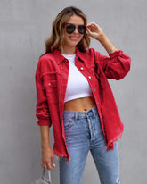 Women wearing a stylish ripped denim jacket for women in red, paired with a crop top and jeans, perfect for autumn and spring fashion.